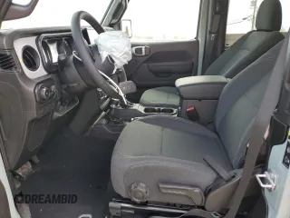 2024 Jeep Wrangler Sport S with VIN 1C4PJXAG2RW335190, listed as a Copart auction lot 51767465 with 2,717 mi miles and Salvage title. Bid and sale history available at DreamBid. Image 7.