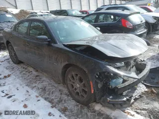 2018 Dodge Charger GT with VIN 2C3CDXJG2JH307760, listed as a IAAI auction lot 41416308 with 76,490 mi miles. Bid and sale history available at carsss.com. Image 1.