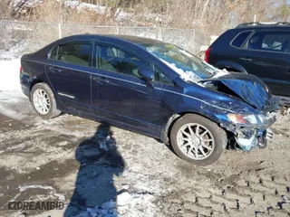 2011 Honda Civic Sdn DX-VP with VIN 2HGFA1F32BH515533, listed as a IAAI auction lot 41595508 with 85,776 mi miles. Bid and sale history available at carsss.com. Image 1.