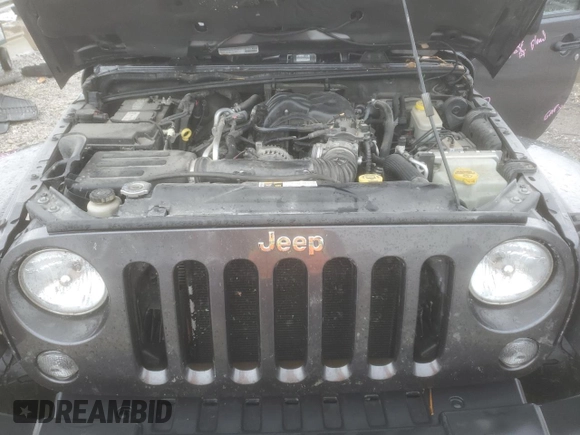 2014 Jeep Wrangler Rubicon with VIN 1C4BJWCG9EL189819, listed as a Copart auction lot 80522204 with 82,083 mi miles and Salvage title. Bid and sale history available at DreamBid. Image 13.
