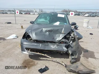 2004 Ford Focus ZTS with VIN 1FAFP38Z94W165483, listed as a IAAI auction lot 41775001 with 222,589 mi miles and . Bid and sale history available at carsss.com. Image 6.