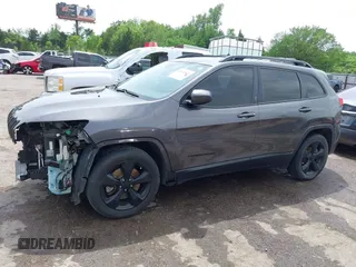 2018 Jeep Cherokee Latitude with VIN 1C4PJLCB2JD595549, listed as a IAAI auction lot 42132845 with 139,819 mi miles and . Bid and sale history available at DreamBid. Image 14.