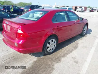 2011 Ford Fusion SE with VIN 3FAHP0HA9BR113305, listed as a IAAI auction lot 42112161 with 217,618 mi miles. Bid and sale history available at carsss.com. Image 4.