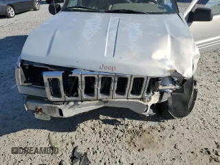 1998 Jeep Grand Cherokee with VIN 1J4GX48Y7WC216585, listed as a Copart auction lot 83532184 with 144,739 mi miles and Salvage title. Bid and sale history available at DreamBid. Image 12.