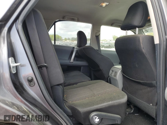 2012 Toyota 4Runner SR5 z VIN JTEZU5JR9C5043602, wystawiony jako Copart lot #51217145 z przebiegiem 233 927 mil mil oraz Szkoda całkowita • Salvage title. Historia ofert i sprzedaży dostępna na DreamBid. Obrazek 11.