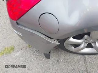 2006 Nissan 350Z Touring z VIN JN1AZ34D56M331590, wystawiony jako IAAI lot #42361928 z przebiegiem Nie podano mil oraz . Historia ofert i sprzedaży dostępna na DreamBid. Obrazek 12.