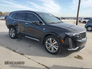 2024 Cadillac XT6 FWD Premium Luxury with VIN 1GYKPCRS7RZ710803, listed as a Copart auction lot 88152345 with 10,409 mi miles and Salvage Title. Bid and sale history available at carsss.com. Image 4.