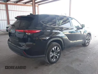 2023 Toyota Highlander L with VIN 5TDKDRAH8PS511517, listed as a IAAI auction lot 42303066 with 39,959 mi miles and . Bid and sale history available at DreamBid. Image 4.