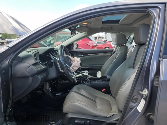 2020 Honda Civic EX-L z VIN 19XFC1F74LE208728, wystawiony jako Copart lot #55990835 z przebiegiem 150 354 mil mil oraz Szkoda całkowita • Salvage title. Historia ofert i sprzedaży dostępna na DreamBid. Obrazek 7.