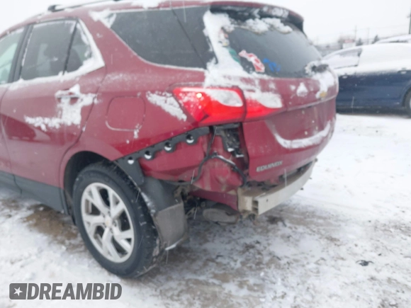 2021 Chevrolet Equinox Premier z VIN 2GNAXXEV4M6105996, wystawiony jako IAAI lot #41402065 z przebiegiem 51 083 mil mil oraz . Historia ofert i sprzedaży dostępna na DreamBid. Obrazek 6.