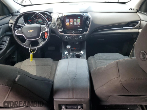 2018 Chevrolet Traverse LT Cloth z VIN 1GNERGKW6JJ200115, wystawiony jako Copart lot #54846515 z przebiegiem 79 785 mil mil oraz Szkoda całkowita • Salvage title. Historia ofert i sprzedaży dostępna na DreamBid. Obrazek 8.