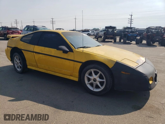 1986 Pontiac Fiero z VIN 1G2PG9796GP256622, wystawiony jako Copart lot #69203894 z przebiegiem 38 964 mil mil oraz Szkody całkowita. Historia ofert i sprzedaży dostępna na DreamBid. Obrazek 4.