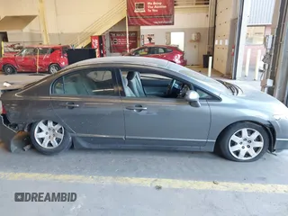 2009 Honda Civic LX z VIN 2HGFA16599H314871, wystawiony jako IAAI lot #41403199 z przebiegiem 144 963 mil mil oraz . Historia ofert i sprzedaży dostępna na DreamBid. Obrazek 12.