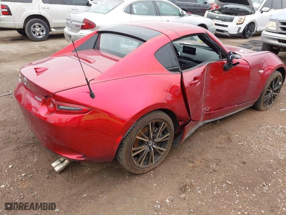 2024 Mazda MX-5 Miata RF Grand Touring with VIN JM1NDAM70R0600649, listed as a IAAI auction lot 41702445 with 3,112 mi miles. Bid and sale history available at carsss.com. Image 4.