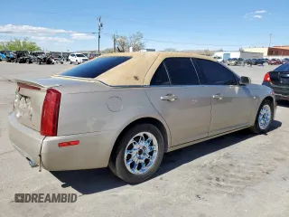 2005 Cadillac STS z VIN 1G6DC67A350148213, wystawiony jako Copart lot #59777405 z przebiegiem 118 027 mil mil oraz Czysty tytuł • Clean title. Historia ofert i sprzedaży dostępna na DreamBid. Obrazek 3.