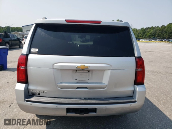 2018 Chevrolet Tahoe LT with VIN 1GNSKBKC7JR382344, listed as a Copart auction lot 58768135 with 103,557 mi miles and Salvage title. Bid and sale history available at DreamBid. Image 6.