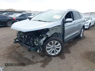 2020 Ford Edge Titanium z VIN 2FMPK4K95LBA16379, wystawiony jako IAAI lot #41190704 z przebiegiem 69 076 mil mil oraz . Historia ofert i sprzedaży dostępna na DreamBid. Obrazek 18.