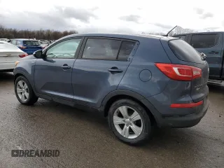 2012 Kia Sportage LX with VIN KNDPBCA25C7285039, listed as a Copart auction lot 52620735 with 197,305 mi miles and Salvage title. Bid and sale history available at DreamBid. Image 2.