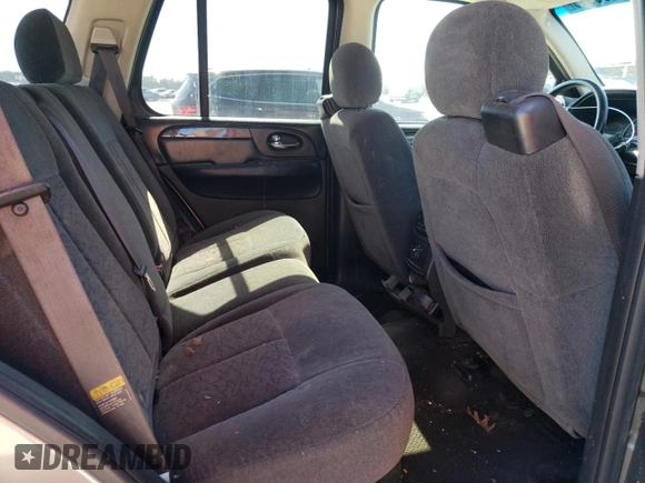 2005 GMC Envoy SLE с VIN 1GKDS13S852264341, выставлен на аукционе Copart как лот 49835015 с пробегом 178 401 миль миль и Списание • Salvage title. История ставок и продаж доступна на DreamBid. Изображение 11.