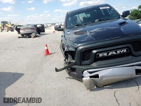 2017 Ram 1500 Rebel z VIN 1C6RR7YT3HS553611, wystawiony jako Copart lot #56063905 z przebiegiem 136 239 mil mil oraz Szkoda całkowita • Salvage title. Historia ofert i sprzedaży dostępna na DreamBid. Obrazek 13.