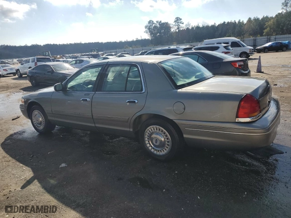 2000 Ford Crown Victoria with VIN 2FAFP73W0YX173874, listed as a Copart auction lot 82113564 with 108,425 mi miles and Salvage Title. Bid and sale history available at carsss.com. Image 2.