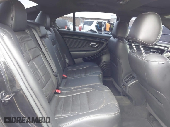 2013 Ford Taurus SHO with VIN 1FAHP2KT1DG113007, listed as a IAAI auction lot 41914541 with 50,630 mi miles and . Bid and sale history available at DreamBid. Image 8.