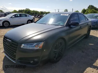 2015 Audi S8 with VIN WAUK2AFD3FN015524, listed as a Copart auction lot 58506754 with 69,866 mi miles and Salvage Title. Bid and sale history available at carsss.com. Image 1.