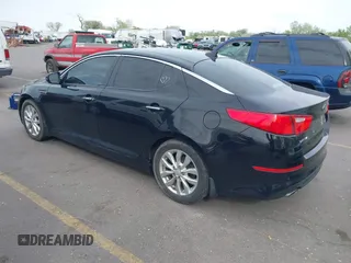 2014 Kia Optima EX with VIN 5XXGN4A7XEG300394, listed as a IAAI auction lot 42117331 with 139,986 mi miles and . Bid and sale history available at carsss.com. Image 3.