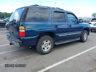 2005 Chevrolet Tahoe LT with VIN 1GNEK13T65J245762, listed as a IAAI auction lot 42796550 with 258,285 mi miles and . Bid and sale history available at DreamBid. Image 4.