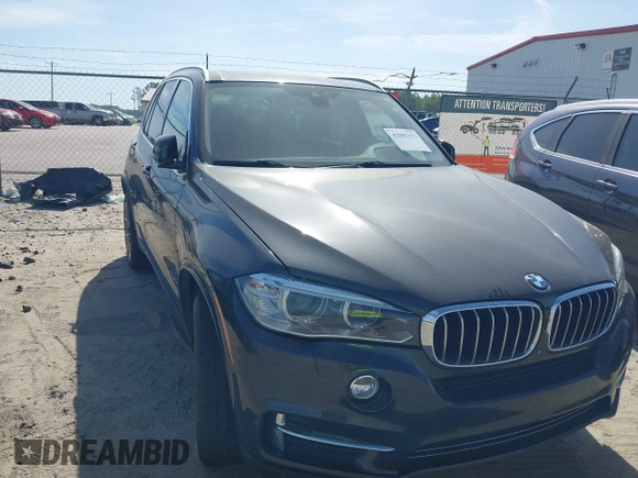 2014 BMW X5 xDrive35d with VIN 5UXKS4C57E0J93982, listed as a IAAI auction lot 42085173 with 169,908 mi miles. Bid and sale history available at carsss.com. Image 19.