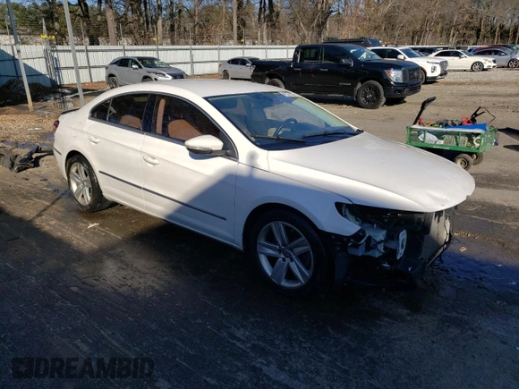 2014 Volkswagen CC Sport with VIN WVWBN7AN4EE525005, listed as a Copart auction lot 41372125 with 104,646 mi miles and Salvage Title. Bid and sale history available at carsss.com. Image 4.