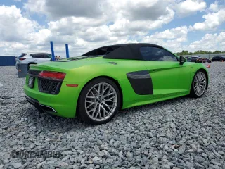 2017 Audi R8 z VIN WUAVACFX5H7903923, wystawiony jako Copart lot #57079895 z przebiegiem 53 882 mil mil oraz Szkody całkowita. Historia ofert i sprzedaży dostępna na DreamBid. Obrazek 3.