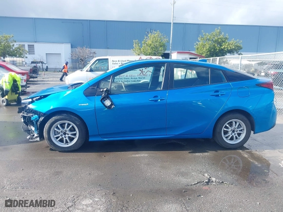 2020 Toyota Prius L Eco with VIN JTDKARFU1L3111938, listed as a IAAI auction lot 41578853 with 117,641 mi miles. Bid and sale history available at carsss.com. Image 15.