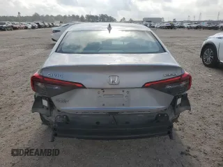 2023 Honda Civic Touring z VIN 2HGFE1F92PH323562, wystawiony jako Copart lot #54060205 z przebiegiem 20 504 mil mil oraz Czysty tytuł • Clean title. Historia ofert i sprzedaży dostępna na DreamBid. Obrazek 6.