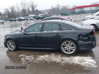 2016 Audi S6 Premium Plus with VIN WAUF2AFC0GN119771, listed as a IAAI auction lot 41541962 with 53,409 mi miles. Bid and sale history available at carsss.com. Image 14.