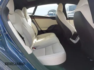 2021 Tesla Model S Long Range with VIN 5YJSA1E51MF442874, listed as a IAAI auction lot 39406495 with 36,127 mi miles and . Bid and sale history available at DreamBid. Image 8.