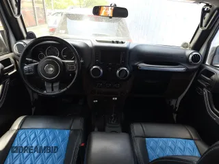 2012 Jeep Wrangler Unlimited Altitude z VIN 1C4HJWEG5CL222948, wystawiony jako Copart lot #61101825 z przebiegiem 106 991 mil mil oraz Czysty tytuł • Clean title. Historia ofert i sprzedaży dostępna na DreamBid. Obrazek 9.