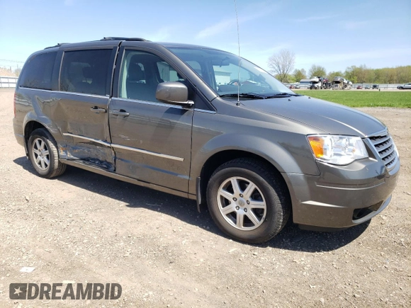 2010 Chrysler Town & Country Touring Plus with VIN 2A4RR8D11AR405610, listed as a Copart auction lot 54742655 with 56,380 mi miles and Salvage Title. Bid and sale history available at DreamBid. Image 4.