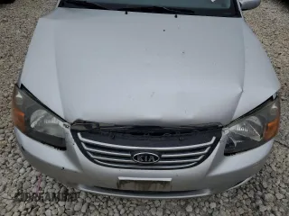 2009 Kia Spectra SX with VIN KNAFE221195656606, listed as a Copart auction lot 84694524 with Not Provided miles and Salvage Title. Bid and sale history available at carsss.com. Image 11.