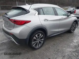 2018 Infiniti QX30 Luxury with VIN SJKCH5CR9JA058968, listed as a IAAI auction lot 41064768 with 64,687 mi miles and . Bid and sale history available at DreamBid. Image 4.