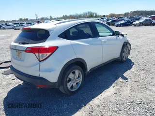 2019 Honda HR-V EX with VIN 3CZRU5H54KM702745, listed as a IAAI auction lot 41829364 with 71,272 mi miles. Bid and sale history available at carsss.com. Image 4.