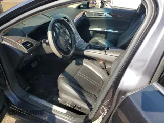 2013 Lincoln MKZ z VIN 3LN6L2G99DR803487, wystawiony jako Copart lot #58232125 z przebiegiem 123 005 mil mil oraz Szkoda całkowita • Salvage title. Historia ofert i sprzedaży dostępna na DreamBid. Obrazek 7.