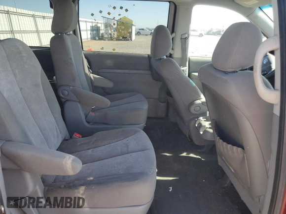 2012 Kia Sedona LX with VIN KNDMG4C79C6483194, listed as a Copart auction lot 77485374 with 110,831 mi miles and Salvage Title. Bid and sale history available at carsss.com. Image 11.