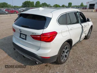 2017 BMW X1 xDrive28i with VIN WBXHT3C39H5F84338, listed as a IAAI auction lot 42400168 with 48,673 mi miles and . Bid and sale history available at DreamBid. Image 4.