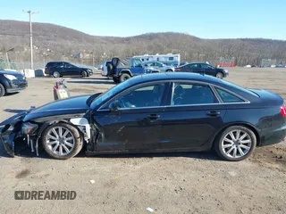 2014 Audi A6 Premium Plus z VIN WAUFGAFC5EN133941, wystawiony jako IAAI lot #41835479 z przebiegiem 68 911 mil mil oraz . Historia ofert i sprzedaży dostępna na DreamBid. Obrazek 14.