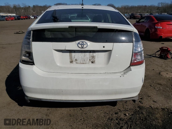 2008 Toyota Prius z VIN JTDKB20UX83354748, wystawiony jako Copart lot #48383175 z przebiegiem Nie podano mil oraz Szkoda całkowita • Salvage title. Historia ofert i sprzedaży dostępna na DreamBid. Obrazek 6.