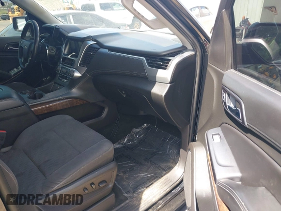 2018 Chevrolet Tahoe LS with VIN 1GNSCAKC9JR183853, listed as a IAAI auction lot 42254267 with 87,351 mi miles and . Bid and sale history available at DreamBid. Image 5.