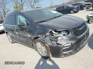 2022 Chrysler Pacifica Touring L z VIN 2C4RC1BG3NR177010, wystawiony jako IAAI lot #41784740 z przebiegiem 73 670 mil mil oraz . Historia ofert i sprzedaży dostępna na DreamBid. Obrazek 1.
