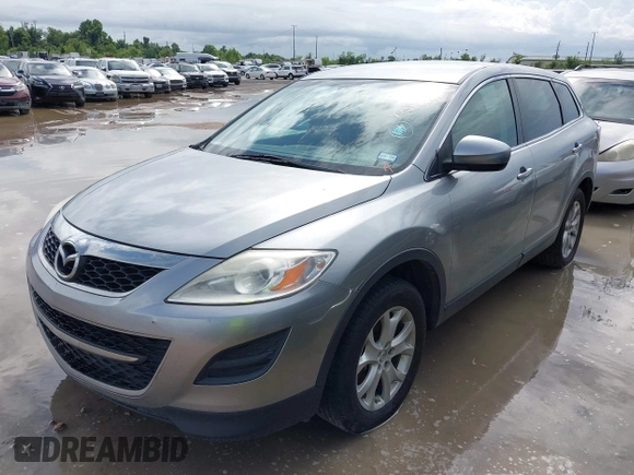 2012 Mazda CX-9 Touring with VIN JM3TB2CA6C0339459, listed as a IAAI auction lot 42586241 with 252,580 mi miles and . Bid and sale history available at DreamBid. Image 2.