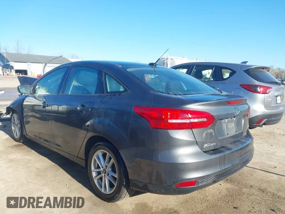 2016 Ford Focus SE with VIN 1FADP3F26GL233564, listed as a IAAI auction lot 42083597 with 153,404 mi miles and . Bid and sale history available at DreamBid. Image 3.